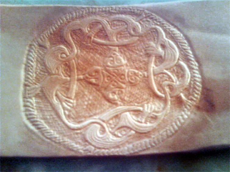 Viking-era designs hand tooled with a stylus